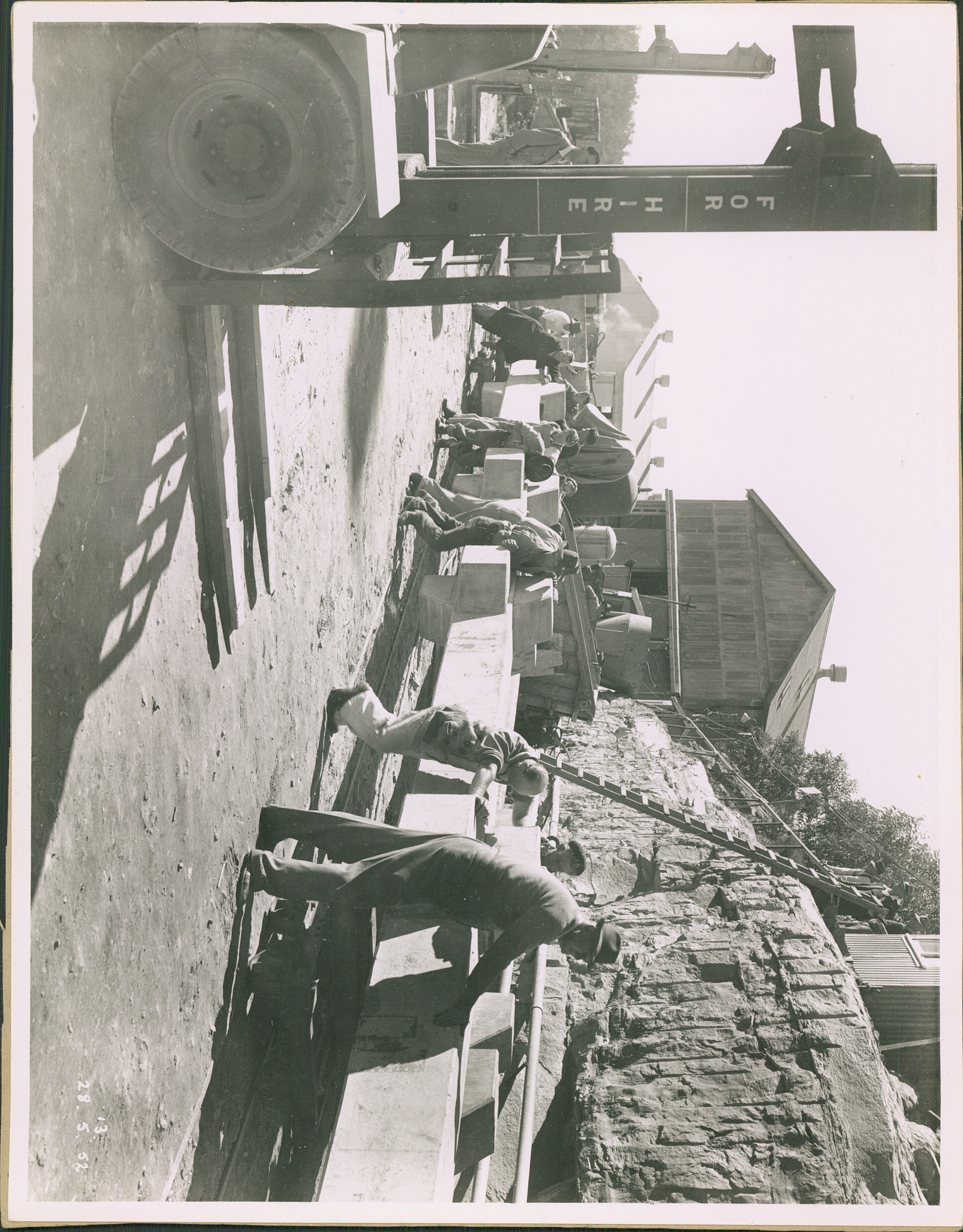 Workers on the dam wall